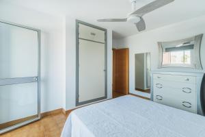 Łóżko lub łóżka w pokoju w obiekcie Dúplex junto a la playa