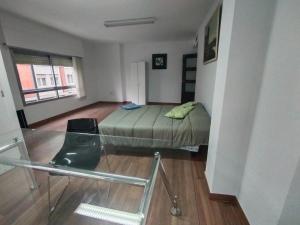 Postel nebo postele na pokoji v ubytování Apartamento Puerta Nueva (Universidad la Merced)