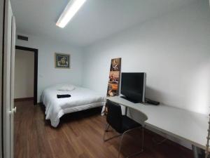 Postel nebo postele na pokoji v ubytování Apartamento Puerta Nueva (Universidad la Merced)