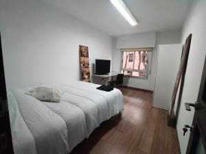Postel nebo postele na pokoji v ubytování Apartamento Puerta Nueva (Universidad la Merced)