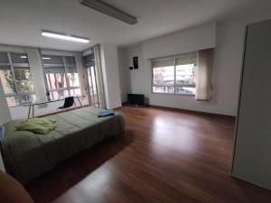 Postel nebo postele na pokoji v ubytování Apartamento Puerta Nueva (Universidad la Merced) + 7 fotografií