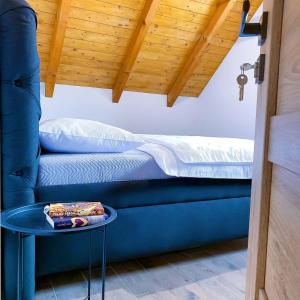 Postel nebo postele na pokoji v ubytování Podhradí Landštejn