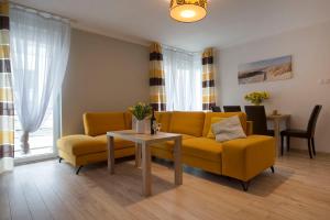 Khu vực ghế ngồi tại Apartamenty Feniks