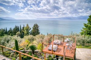 a house with a view of the water at Magical view studios Asproneri, Kamena Vourla in Kamena Vourla