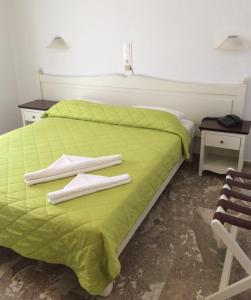 Ένα ή περισσότερα κρεβάτια σε δωμάτιο στο Pension Askas