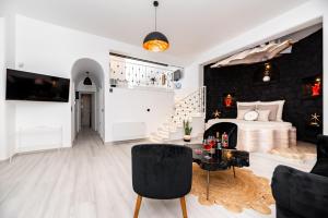 Posezení v ubytování Villa Concha Con Perla