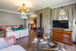 Telewizja i/lub zestaw kina domowego w obiekcie Cypress House