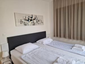 Postel nebo postele na pokoji v ubytování Premium Apartment Maj ****