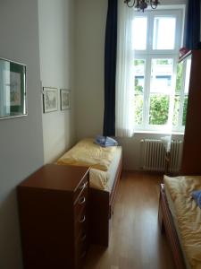 En eller flere senge i et værelse på Schöne Ferienwohnung in Seebad Bansin 200m vom Strand (Heringsdorf, Kaiserbäder, Usedom)