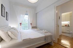 Ein Bett oder Betten in einem Zimmer der Unterkunft Vedrana-near centre and free garage, electricity for electric cars