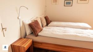 Ein Bett oder Betten in einem Zimmer der Unterkunft Casa Teatro Panoramico 5 Star Holiday House