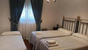 Posteľ alebo postele v izbe v ubytovaní Finca Cerro del Moro