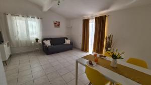 Posezení v ubytování Apartmani Tolj