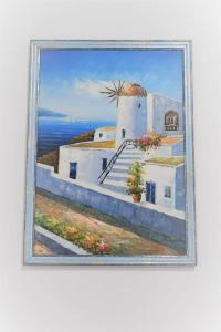 a painting of a white building with a windmill at [Sea Garden] Elegant Villa with a View in Rio nellʼElba