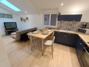 Kuchyňa alebo kuchynka v ubytovaní Cottage neuf - Forêt de Tronçais