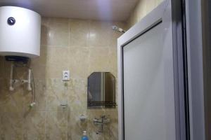 Ένα μπάνιο στο Mtis Kheoba Apartment