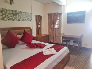 Postel nebo postele na pokoji v ubytování Mysa Homestays