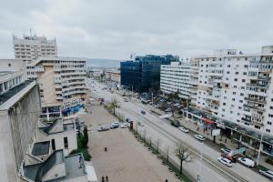 a view of a city with buildings and a street at Carla's Studio Central Palas, airport shuttle in Iaşi