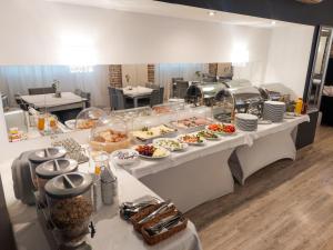 a buffet line with many different types of food at Karat in Warsaw