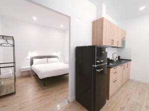 Kuchyň nebo kuchyňský kout v ubytování Apartamentos La Brava by gaiarooms