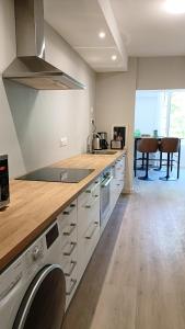 a kitchen with a counter and a stove top oven at Dastro Logis in Saint-Rémy-de-Provence