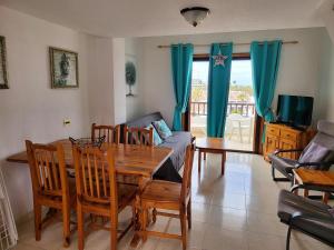 TV a/nebo společenská místnost v ubytování Parque Santiago II - 1 Bed Sea View