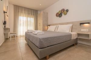 Posteľ alebo postele v izbe v ubytovaní Evriali Comfort Living