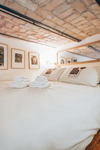 Säng eller sängar i ett rum på Restart Accommodations Farnesina