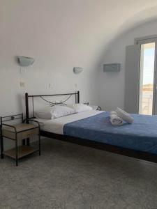 Postel nebo postele na pokoji v ubytování M.G. Hotel Studio & Apts