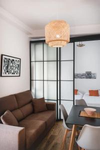 Et opholdsområde på Apartamentos y Estudios Casa de la Hoya