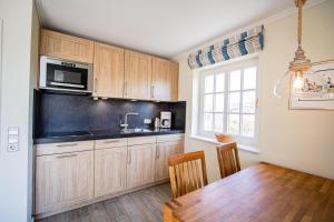 Kuchyň nebo kuchyňský kout v ubytování Taal-Huis-1b