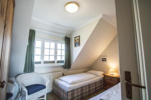 Postel nebo postele na pokoji v ubytování Taal-Huis-1b