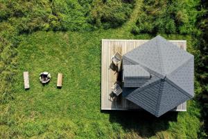 an overhead view of a deck with an umbrella at Lower Marsh Farm in Cornwall in Saltash