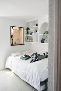 Posteľ alebo postele v izbe v ubytovaní Casa Alana- Apartamentos en Suite Budha- Las mejores vistas y ubicación ! + 37 fotografií