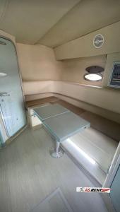 a small room with a table in the middle at AIR OF SEA ON BOAT in Salerno