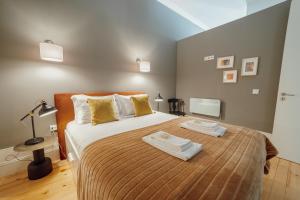 Postel nebo postele na pokoji v ubytování Downtown Excellence Apartment by Vacationy