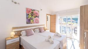 Posteľ alebo postele v izbe v ubytovaní Casita El Puerto Vélez-Málaga by Ruralidays