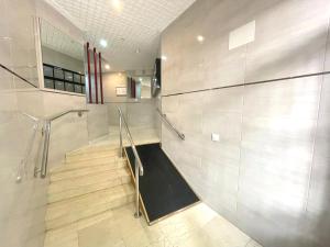 a staircase in a building with a stair case at La Linea in Calpe