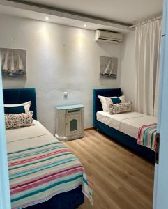 Postel nebo postele na pokoji v ubytování Byblos Mare-The Exclusive Beach Front Villa