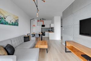 Telewizja i/lub zestaw kina domowego w obiekcie Apartamenty "Bastion Wałowa'' Q4Apartments