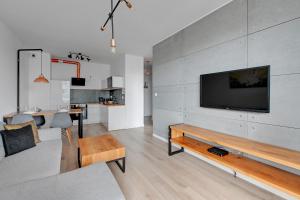 Kuchnia lub aneks kuchenny w obiekcie Apartamenty "Bastion Wałowa'' Q4Apartments