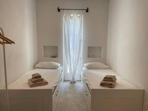 En eller flere senge i et værelse på Villa Paolo - Rosa Marina Ostuni + 36 billeder