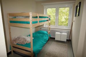 Postel nebo postele na pokoji v ubytování Oostduinkerke Apartments