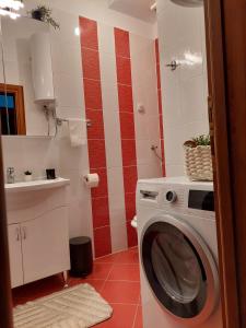 Ванна кімната в OMIŠ WIND ROSE Apartment
