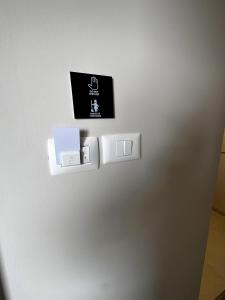 a refrigerator with a sign on the side of it at Romula Imperial in Caracal +38 photos