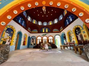 a large room with a large archway in a building at Kato Dool Wellness Resort in Aswan