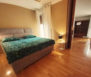 Ein Bett oder Betten in einem Zimmer der Unterkunft Beautiful Apartment, Close to Beach