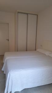 Postel nebo postele na pokoji v ubytování Sal Mar Suites
