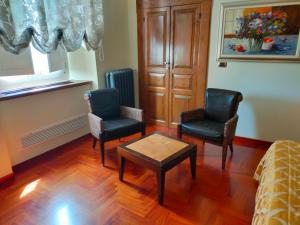 Posezení v ubytování Regis Resort & Wellness