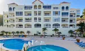 a view of the hotel from the pool at Mona's Point Tenerife in San Miguel de Abona